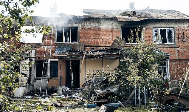 A Ukrainian mother who was pregnant with twins has died after her village was struck by an overnight Russian drone attack. Her two small sons, aged four and six, and her husband were also killed. Pictured: Remains of building struck by Russian drone attack on September 30, 2025 in Chernechchyna
