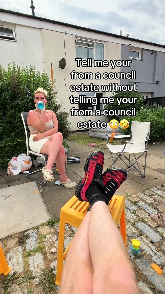 Photo of a couple sitting outside in a garden; the text overlay asks, "Tell me your council estate without telling me your council estate."