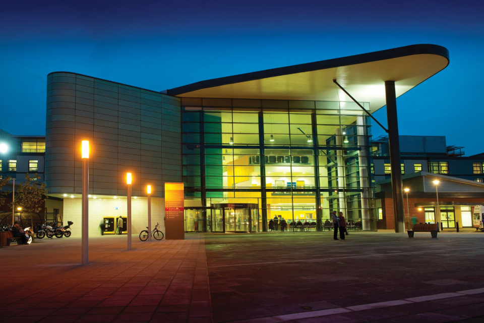 Hospital entrance at night.