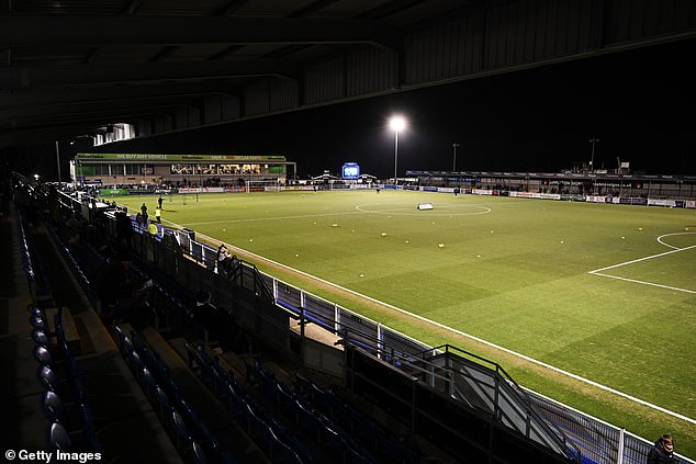 A National League clash between Eastleigh and Scunthorpe was abandoned in stoppage time after a clash of heads