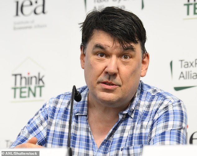 Police were accused of a 'totalitarian' clampdown on free speech after the creator of Father Ted was arrested by armed officers over online comments about transgender activists