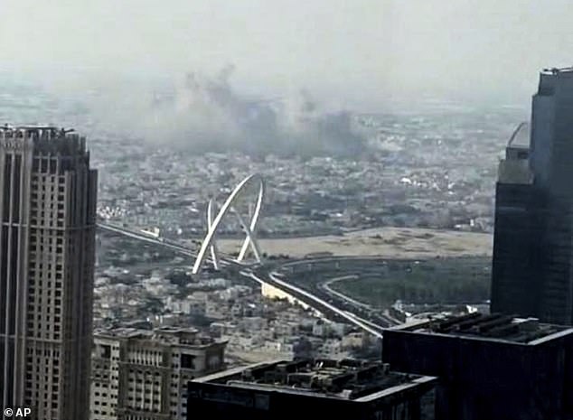 Smoke rises from an explosion caused by an Israeli strike, in Doha, Qatar