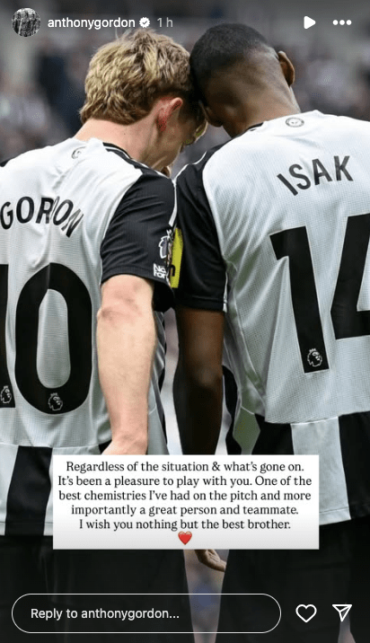 Two soccer players embracing.