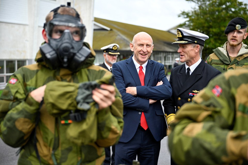 British Defence Secretary John Healey with Norwegian military officials.
