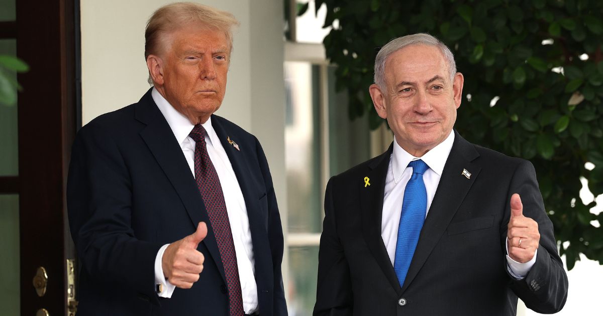 President Donald Trump and Israeli Prime Minister Benjamin Netanyahu give a "thumbs up" sign at the White House Monday in Washington, D.C.