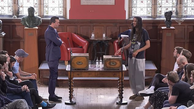 The incoming president of the Oxford Union George Abaraonye debates American conservative activist Charlie Kirk during an event in May