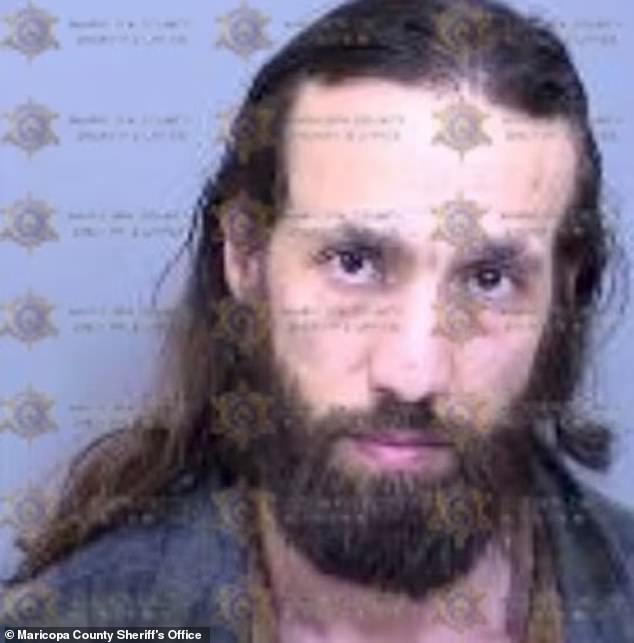 Pictured: Joshua Runkles, 42, has been identified as the man who allegedly impersonated a police officer at the site of the Charlie Kirk memorial in Arizona