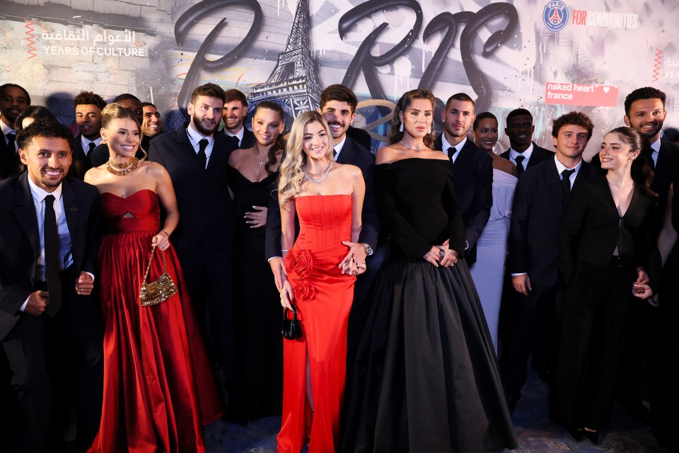 PSG players and their partners pose for the Paris Saint-Germain Communities Foundation Gala.