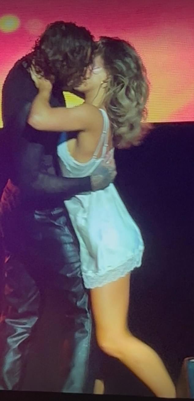 The former TOWIE star surprised fans by sharing three passionate kisses with the Polish ballroom professional at London's O2 Arena on Friday evening