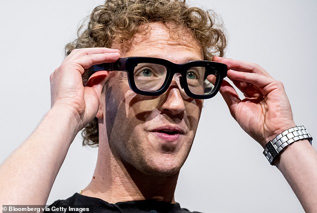 Zuckerberg (pictured trying on Orion augmented reality glasses in 2024) is luring top Artificial Intelligence researchers with pay packages of up to $300 million over four years