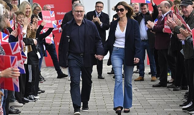 The Prime Minister grinned broadly as he arrived in Liverpool for the annual Labour Party conference hand-in-hand with wife Victoria