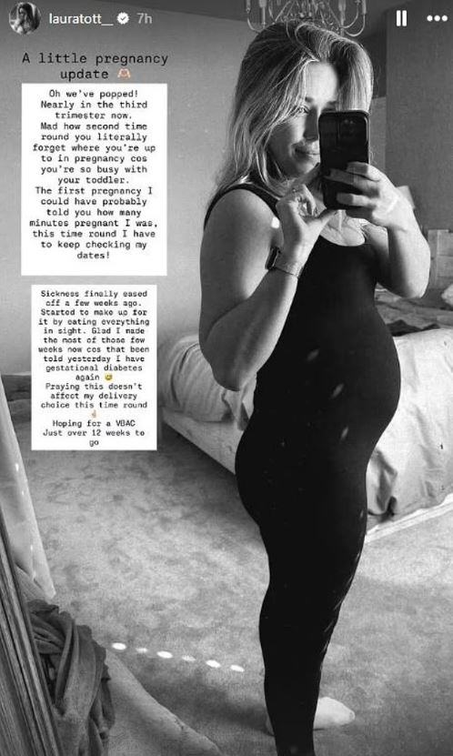 Black and white photo of a pregnant woman in a black outfit, taking a mirror selfie, with text overlay discussing her second pregnancy.