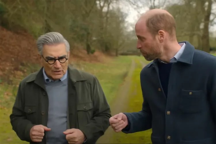 Prince William and Eugene Levy in a scene from *The Reluctant Traveler*.