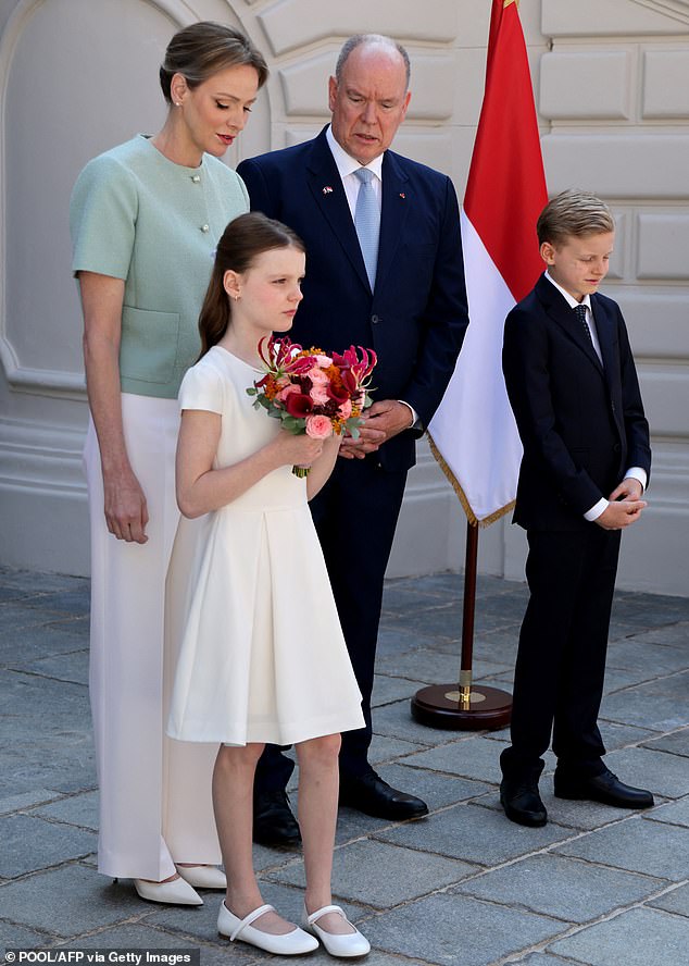Pictured: Monaco's Royal Family waiting for the arrival of France's President for a two-day state visit at the Prince's Palace in Monaco earlier this summer