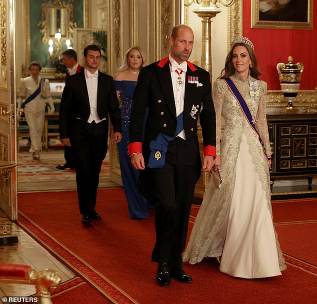 Prince William arrives wearing a Windsor tail coat, with Princess Kate sporting a couture gown by British designer Phillipa Lepley. Trump's daughter, Tiffany, is seen behind with her husband Michael Boulos
