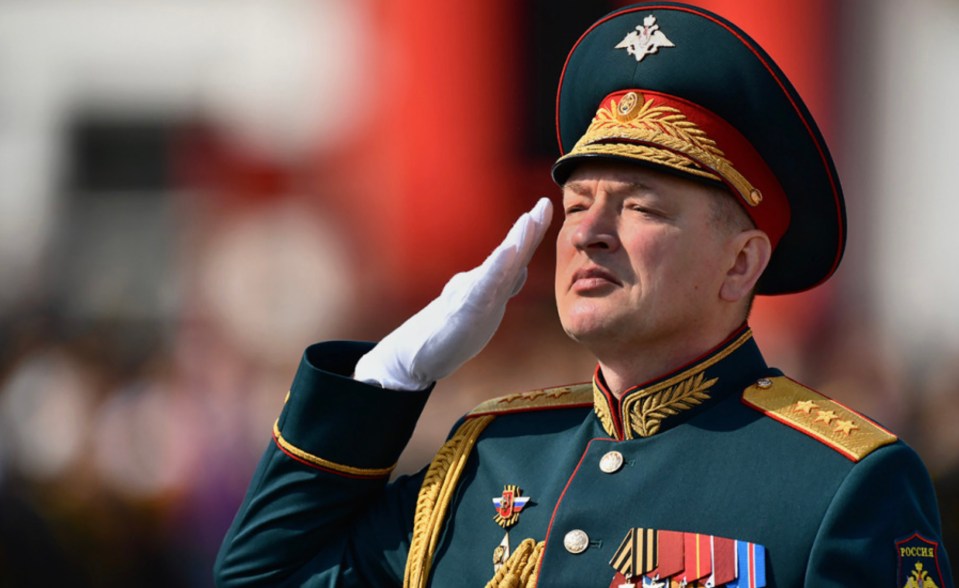 Colonel General Alexander Lapin saluting.