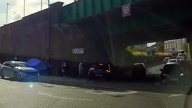 Dashcam footage caught the moment one driver had stopped after hitting the kerb
