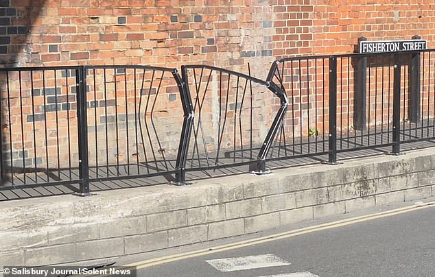 Railings to protect pedestrians walking close to a 'killer kerb' that has racked up thousands of pounds worth of damage are already 'mangled' just weeks after being installed