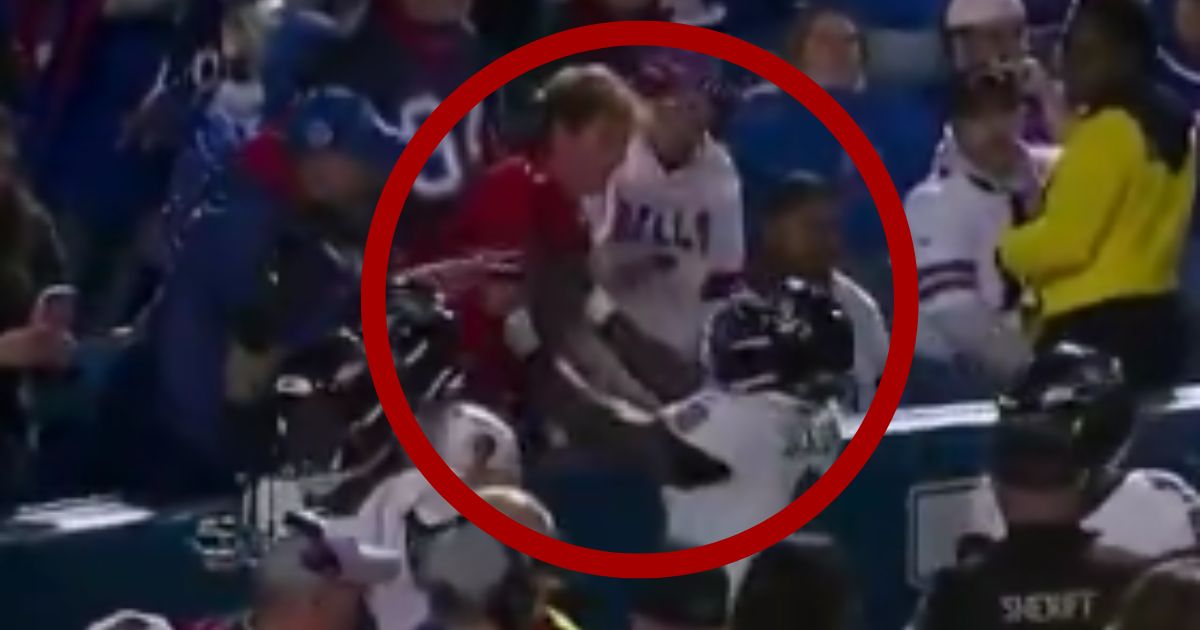 Baltimore Ravens quarterback Lamar Jackson, circled right, got into a physical altercation with a Buffalo Bills fan, circled left, on Sunday night.