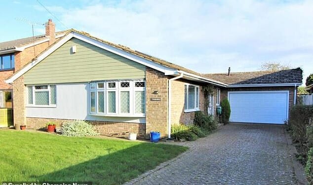 Mr Smedley's house before the fire which sparked a bitter legal battle with his next-door neighbours