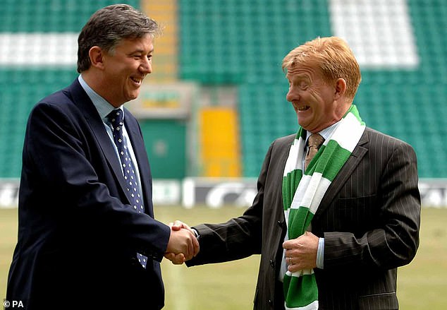 Strachan in typically wise-cracking mood as he is unveiled as new Celtic manager by chief executive Peter Lawwell in 2005