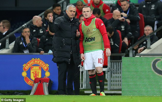 Wayne Rooney (right) has recounted an exchange he had with Jose Mourinho (left) back when they were both at Man United