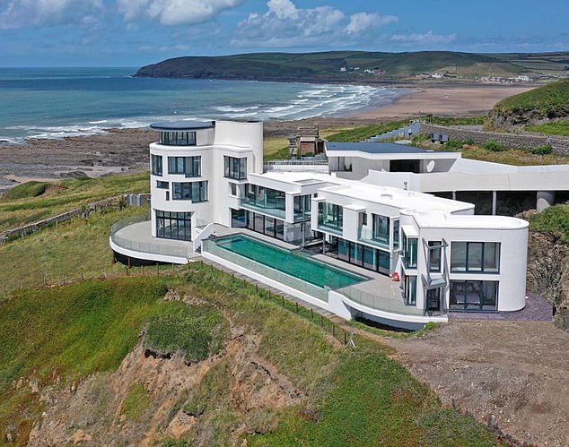 Edward Short and his wife Hazel put their life savings into building their fantasy eco-friendly home, known as Chesil Cliff House