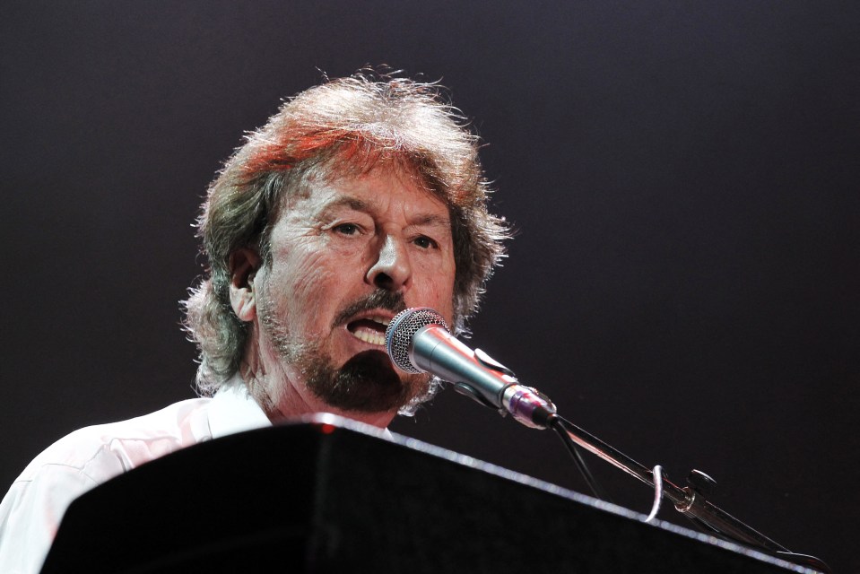 Rick Davies of Supertramp performing on stage.