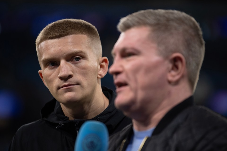 Former world champion boxer Ricky Hatton with his son Campbell Hatton before a UEFA Champions League match.