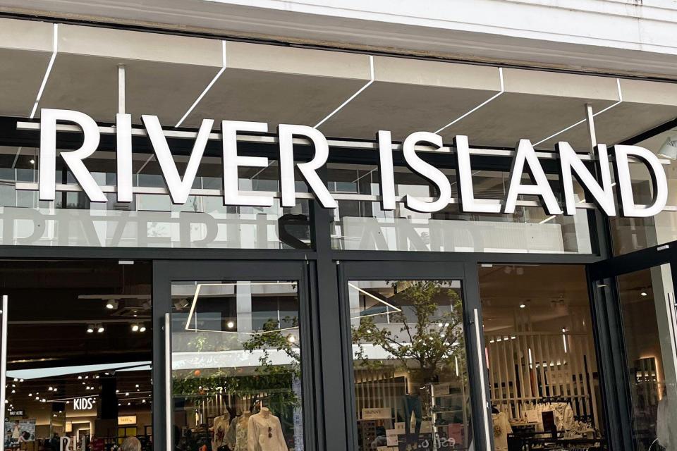 River Island store sign.