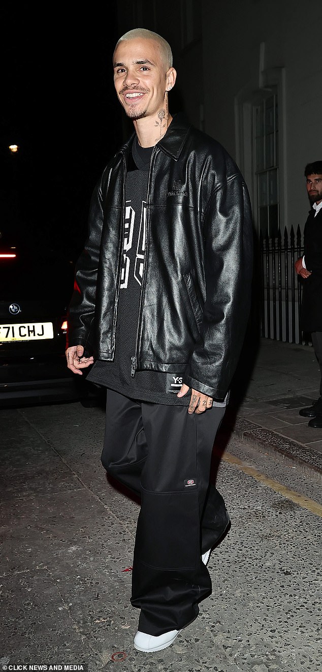 Romeo Beckham cut a trendy figure in a black leather jacket as he celebrated his 23rd birthday with family at the lavish London venue Aki on Friday