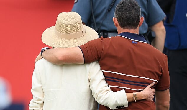 Rory McIlroy and wife Erica left the course arm-in-arm after a day of vitriol in New York