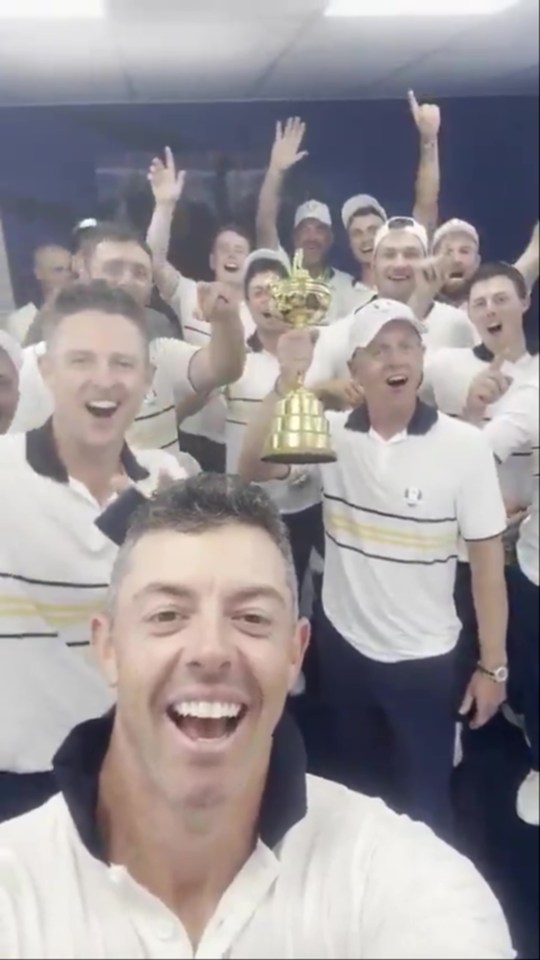 The European Ryder Cup team celebrating their victory, with Rory McIlroy in the foreground.
