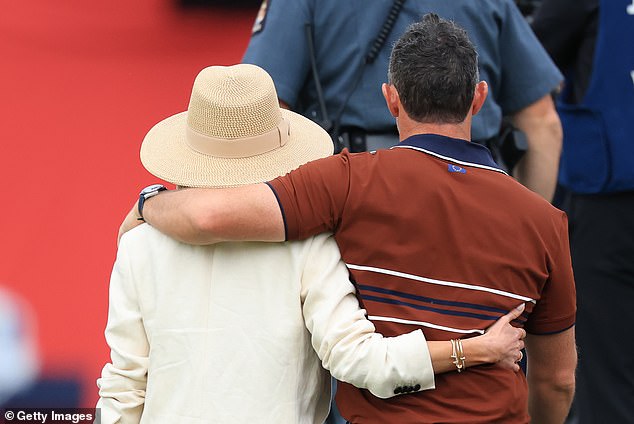 She and Rory left the course arm-in-arm after a day of vitriol in New York