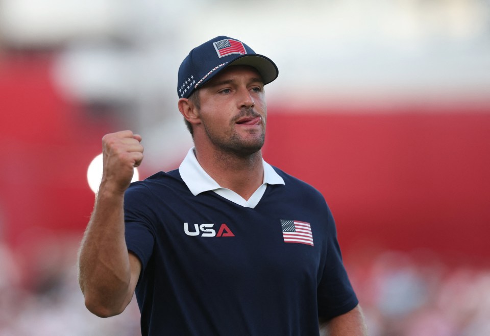 Golf - The 2025 Ryder Cup - Bethpage Black Golf Course, Farmingdale, New York, United States - September 27, 2025 Team USA's Bryson DeChambeau celebrates after holing his putt on the 1st hole during the foursomes REUTERS/Paul Childs