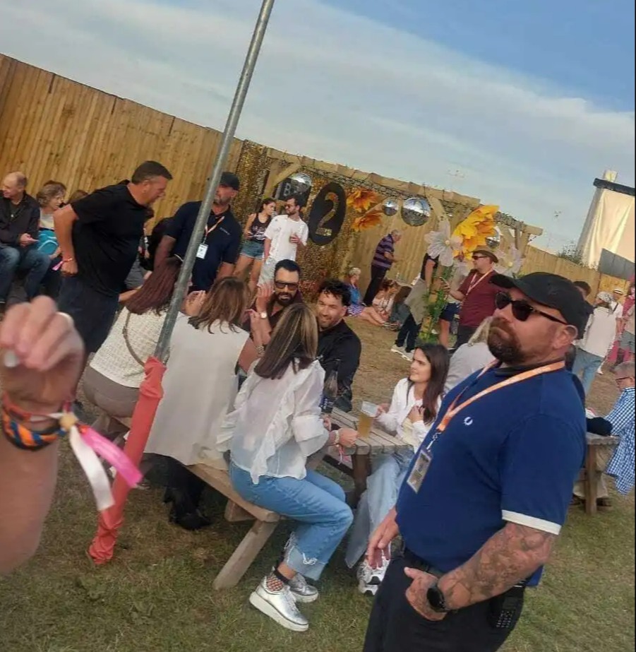 Rylan Clark with his boyfriend and mother at a music festival.