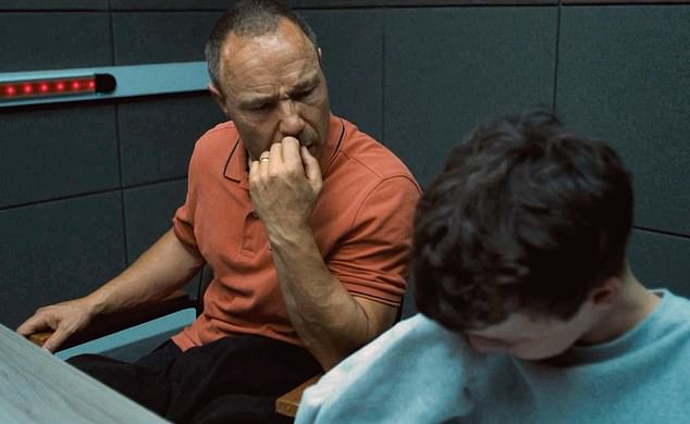 Owen Cooper and Stephen Graham in Adolescence episode one, as Jamie is quizzed by police