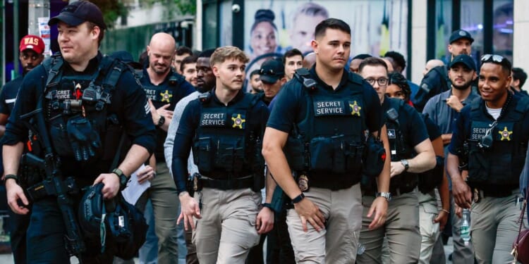 Members of the Secret Service walk the outside the United Nations headquarters ahead of the United Nations General Assembly in New York City on Sunday.