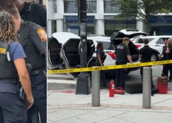 Fire investigators examine the Secret Service vehicle that caught fire Monday in Washington, D.C.