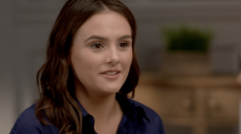 A 15-year-old girl named Lulu Gribbin smiling, facing to the right of the frame, with long brown hair and wearing a dark blue shirt.