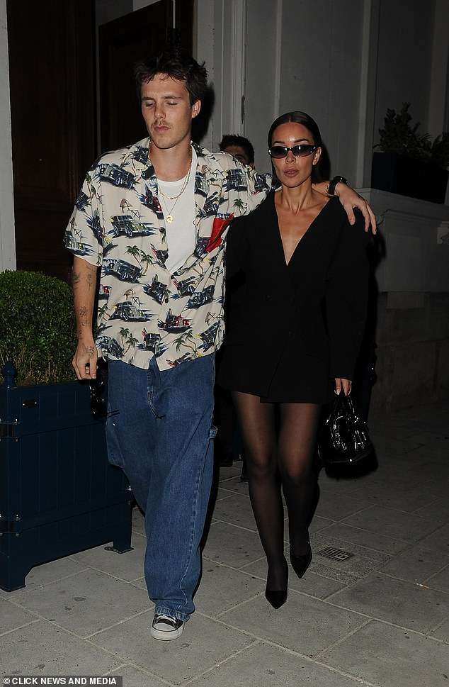 You could be forgiven for thinking the woman in this photograph is Victoria Beckham... but it’s Cruz’s girlfriend, Jackie Apostel, who is increasingly becoming a dead ringer for her boyfriend’s mum