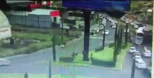 Security camera footage of a train hitting a double-decker bus.