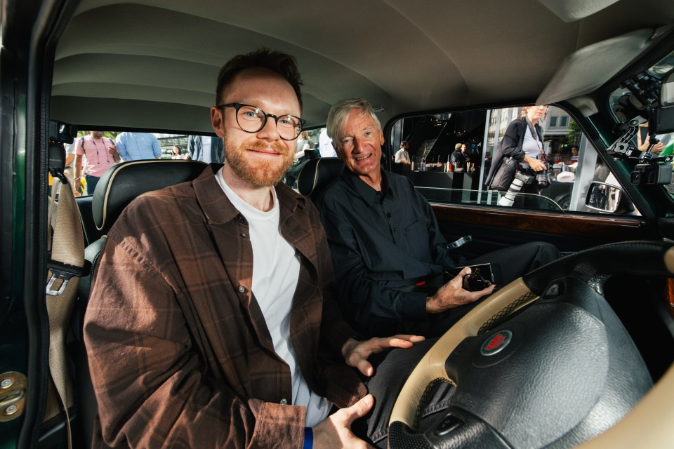 Two men sitting in a car.