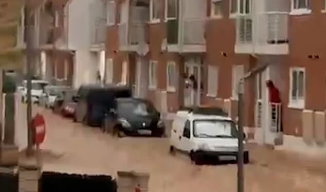Spain has been lashed by torrential downpours, with a red alert warning issued as devastating flash floods tear through the country