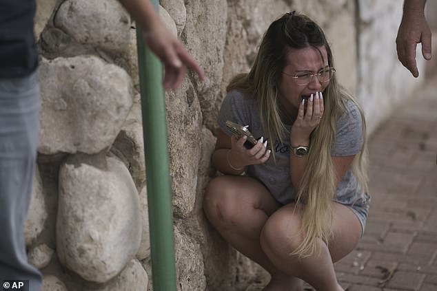 The annals of British statecraft are littered with decisions that have been naive, foolish and downright shameful. But none to my mind reeks of the moral degeneracy of recognising a Palestinian state. Pictured: Israelis take cover from rocket fire on October 11, 2023