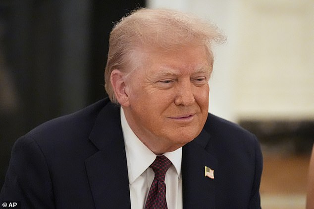 Donald Trump (pictured) has been urged to block the controversial Chagos Islands deal – with critics warning it could cost as much as £47billion