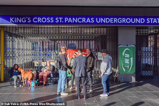 RMT members congregated on the picket line outside King's Cross St Pancras Underground