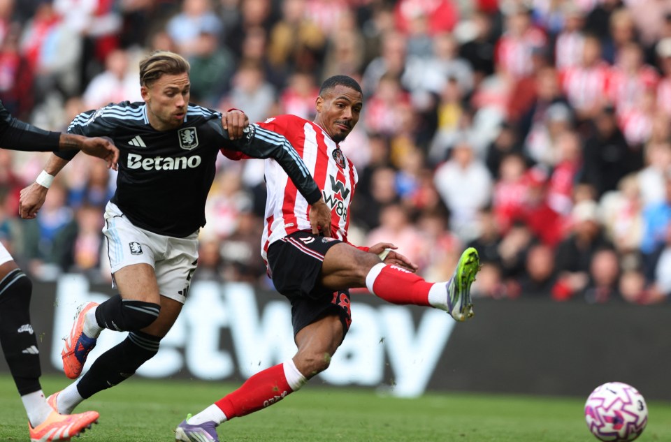 Aston Villa's Matty Cash in action as Sunderland's Wilson Isidor scores a goal.