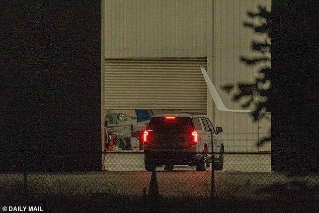 Swift's convoy is seen entering the hangar