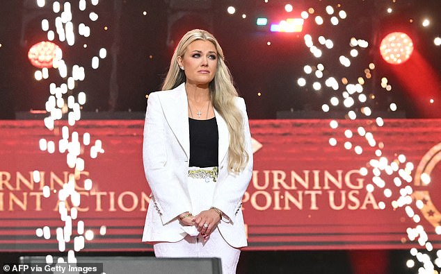 Erika Kirk looks out over the huge crowd at the State Farm Stadium in Glendale, Arizona, as she eulogizes her late husband